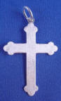 textured back of this sterling silver cross pendant
