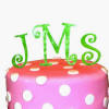 acrylic monogram cake topper in curlz font in marble lime color