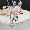 crystal heart drops on this wedding cake topper, wedding cake jewels, wedding cake jewelry