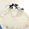 polished metal dancing bride and groom wedding cake topper