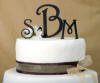 brown metal monogram wedding cake topper