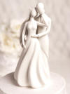 stylized bride and groom figurine wedding cake topper