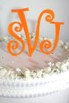 orange acrylic wedding cake mongoram topper curlz font