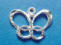 sterling silver butterfly charm with diamond-cut accents