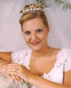 Mel is wearing pearl and crystal twist jewelry on her wedding day - necklace, bracelet and earrings
