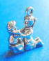 sterling silver girl opening doll present charm
