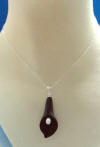sterling silver hand-carved black onyx calla lily with freshwater pearl center necklace