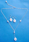 2-piece mother-of-pearl and pearl sterling silver drop-style calla lily necklace and earrings jewelry set.