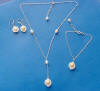 Sterling silver mother-of-pearl and freshwater pearl bridal necklace, bracelet and earrings jewelry set.