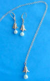 14k gold calla lily necklace and earrings set - made with freshwater pearls - the earrings are 14k gold leverbacks.