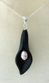 this customer wanted a pink freshwater pearl in the center of the black onyx calla lily sterling silver necklace - you can choose what you want in the center of the carved gemstone calla lily pendant