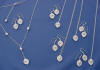 Beautiful calla lily wedding jewelry - the lariat design set for the bride and the single drop sets for the bridesmaids