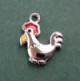 sterling silver rooster charm with red and yellow enamel accents