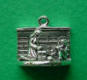 sterling silver 3-d charm - two children with gifts at a fireplace