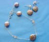 Sterling silver coin pearl bracelet and earrings jewelry set.