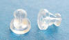 Clear plastic barrel-shaped earnuts for the backs of pierced earrings.