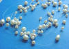 different shapes and sizes of beautiful freshwater pearls