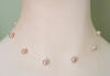 single strand pink pearl illusion necklace