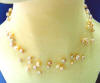5-strand peach/pink pearl illusion necklace