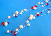triple-strand bridesmaid illusion necklace made with pearls, garnet & siam crystals