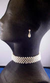 side view of bridal necklace and earrings