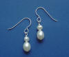 The matching sterling silver Frenchwire earrings feature matching freshwater pearls