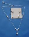 The bridesmaid set is a handcrafted sterling silver filigree freshwater pearl necklace and earrings 2-piece jewelry set.