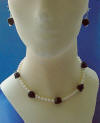 Handcrafted genuine handcarved black onyx rose and freshwater pearl necklace and earrings