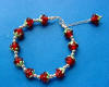 handcrafted sterling silver red roses and sterling silver beads bracelet