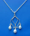 sterling silver rosebud pendant with dangling freshwater pearls