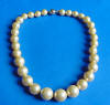 graduated golden shell pearl necklace