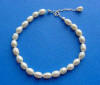 classic pearl line bracelet with sterling silver clasp and 1" extender