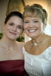 Jill is Tammy's matron of honor and she is wearing our drops of pearls necklace and earrings