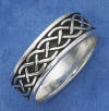 sterling silver 7mm wide antiqued background with loose celtic woven pattern design wedding band