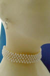 A side view of this necklace and earrings