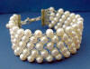 Here is the matching sterling silver freshwater pearl woven 5-strand bracelet in this bride's wedding day jewelry set.