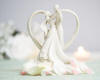 porcelain stylized dancing bride and groom with heart wedding cake topper figurine