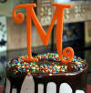 orange acrylic curlz font letter m cake topper - great for wedding cake topper, birthday cake topper, anniversary cake topper