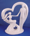 heart with stylized bride and groom wedding cake topper called take my hand