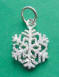 sterling silver snowflake charm textured with glitter
