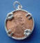 sterling silver lucky penny holder charm shown with penny inserted - a good idea is to use a penny with the birth year or the marriage year of the bride