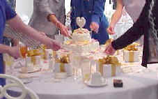 A bridesmaid charm cake - also called Victorian ribbon pull, cake charms, or cake pulls.