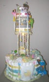 baby diaper towel cake centerpiece with charms