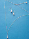 Sterling silver freshwater pearl calla lily necklace and earrings jewelry set.