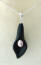 handcarved matte black onyx calla lily pendant