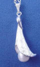 side view of thai silver pearl calla lily pendant