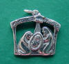 sterling silver handmade Christmas nativity charm - manger scene is on both sides of this charm