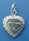 sterling silver heart charm with two interlocking hearts inside