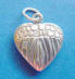 sterling silver angel charm - her wings form a heart