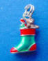sterling silver green and red enamel christmas stocking stuffed with brown enamel bear and other toys